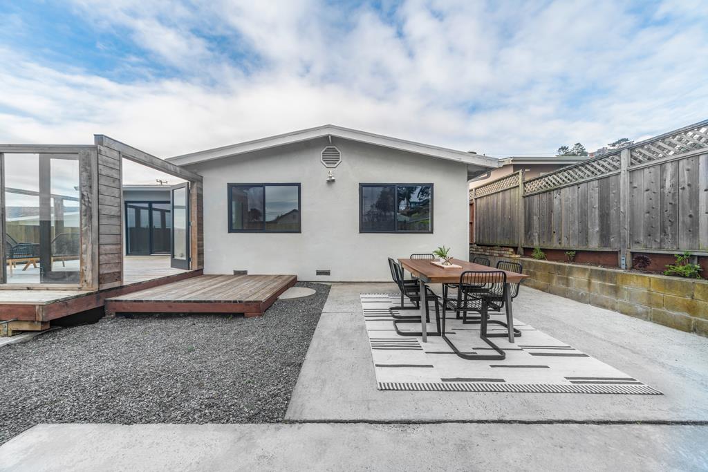 370 Monterey Road Pacifica, CA 94044 - Photo 18 of 31 a living room with furniture and a table