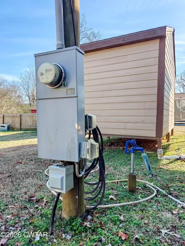a view of a back yard of the house