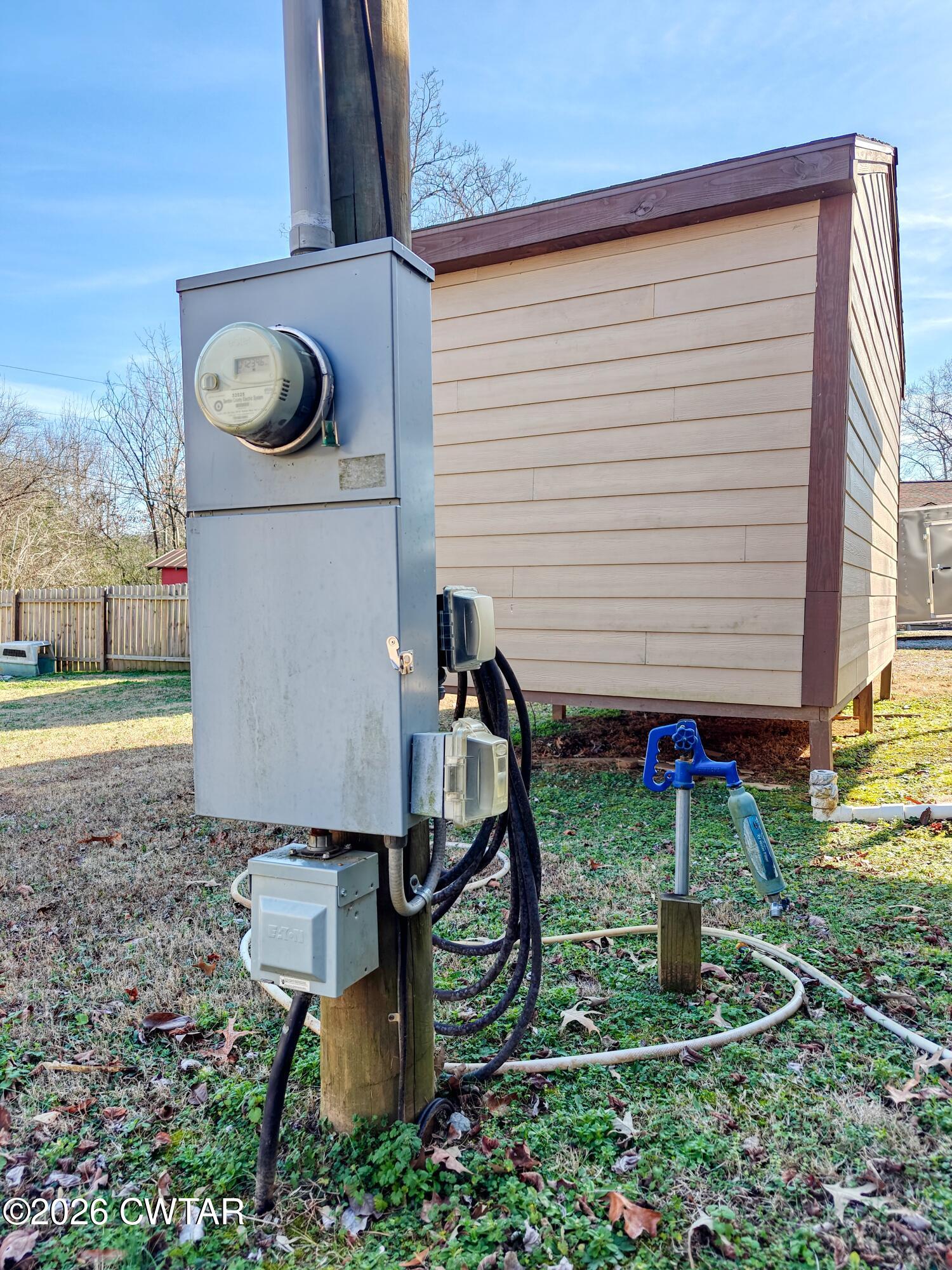 202 Eva Beach Drive Eva, TN 38333 - Photo 19 of 34 a view of a back yard of the house
