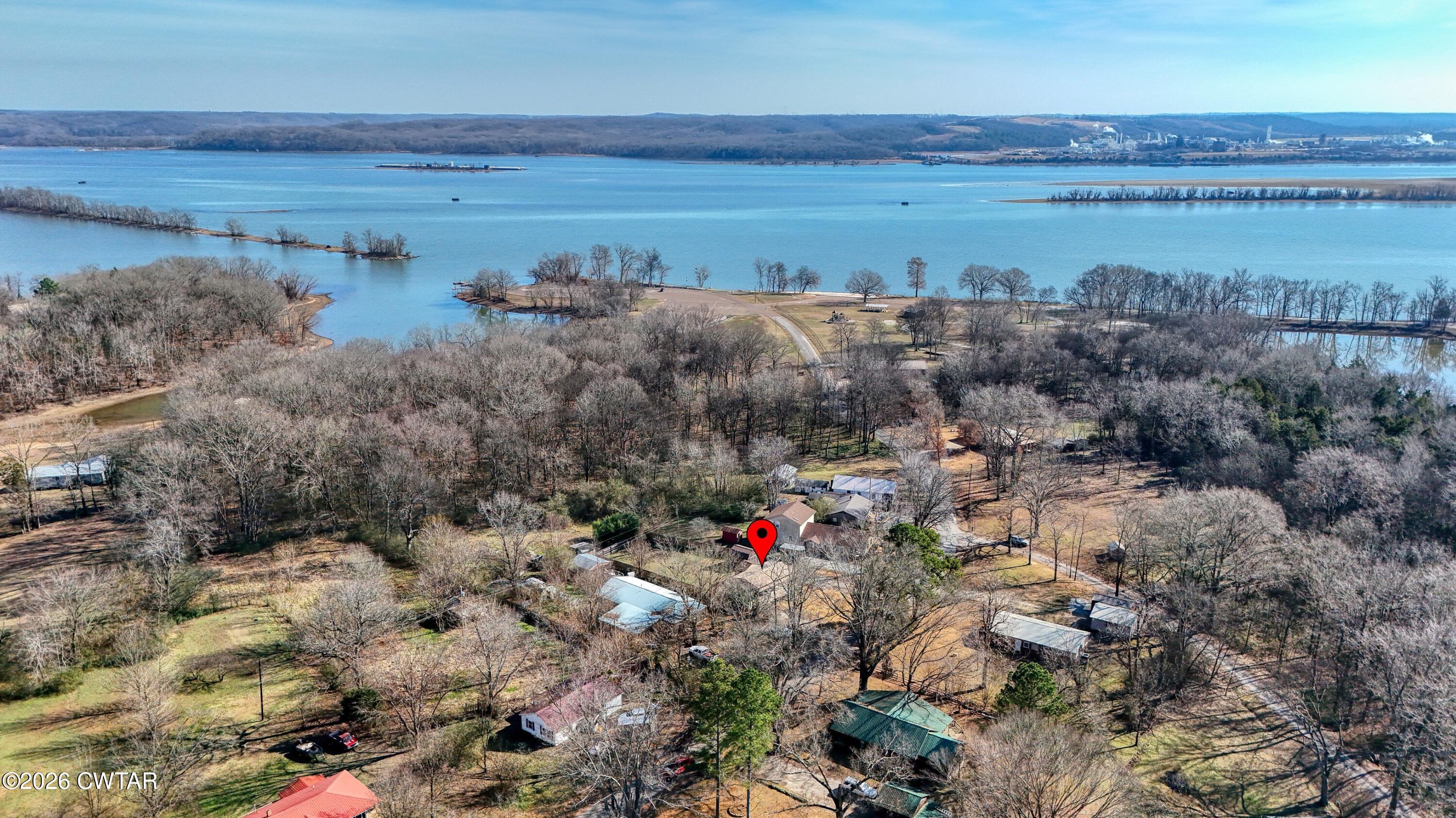 202 Eva Beach Drive Eva, TN 38333 - Photo 26 of 34 a view of lake with outdoor space