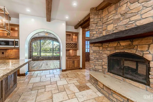 a view of swimming pool with seating area and furniture