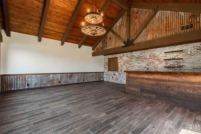 a bathroom with a sink a shower and a mirror