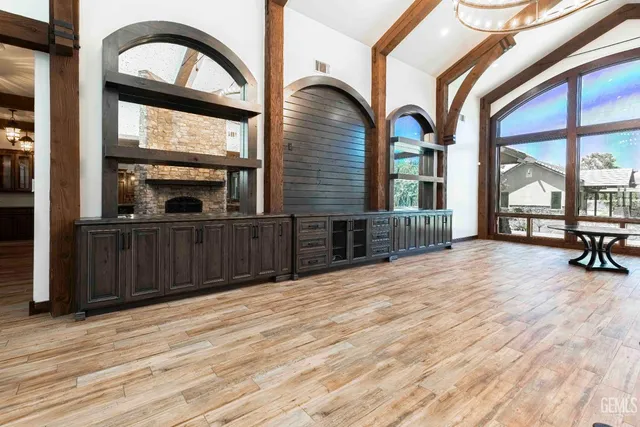 a kitchen with a sink and a refrigerator