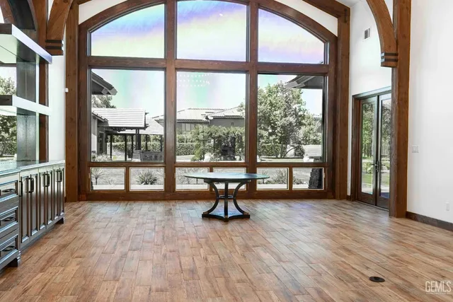 a kitchen with stainless steel appliances granite countertop a stove a sink and dishwasher