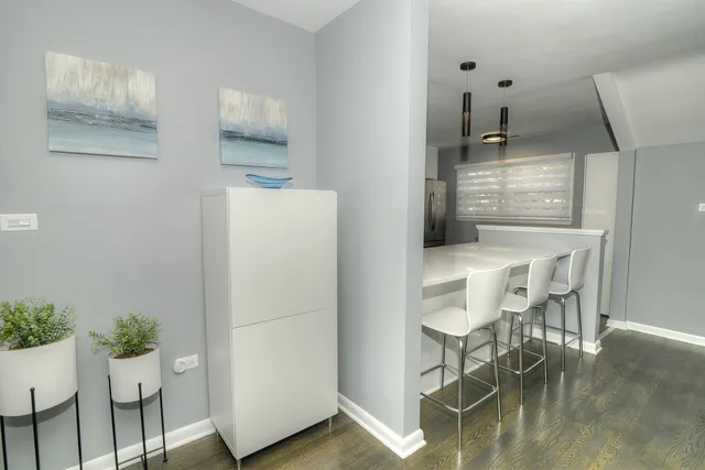 a room with furniture and wooden floor