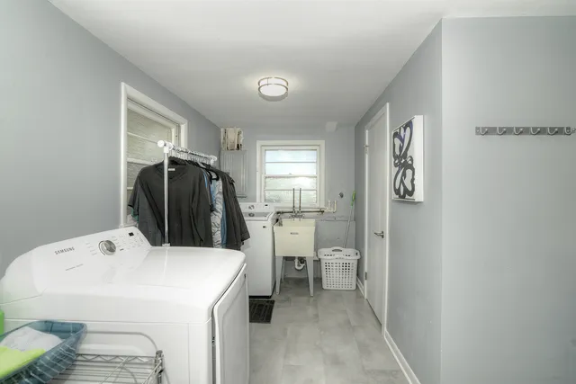 a utility room with dryer and washer