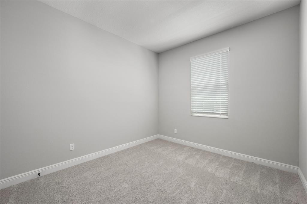 1813 Gaiety Way Fort Pierce, FL 34947 - Photo 11 of 16 an empty room with a window