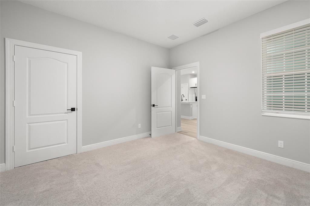 1813 Gaiety Way Fort Pierce, FL 34947 - Photo 14 of 16 a view of an empty room with a window