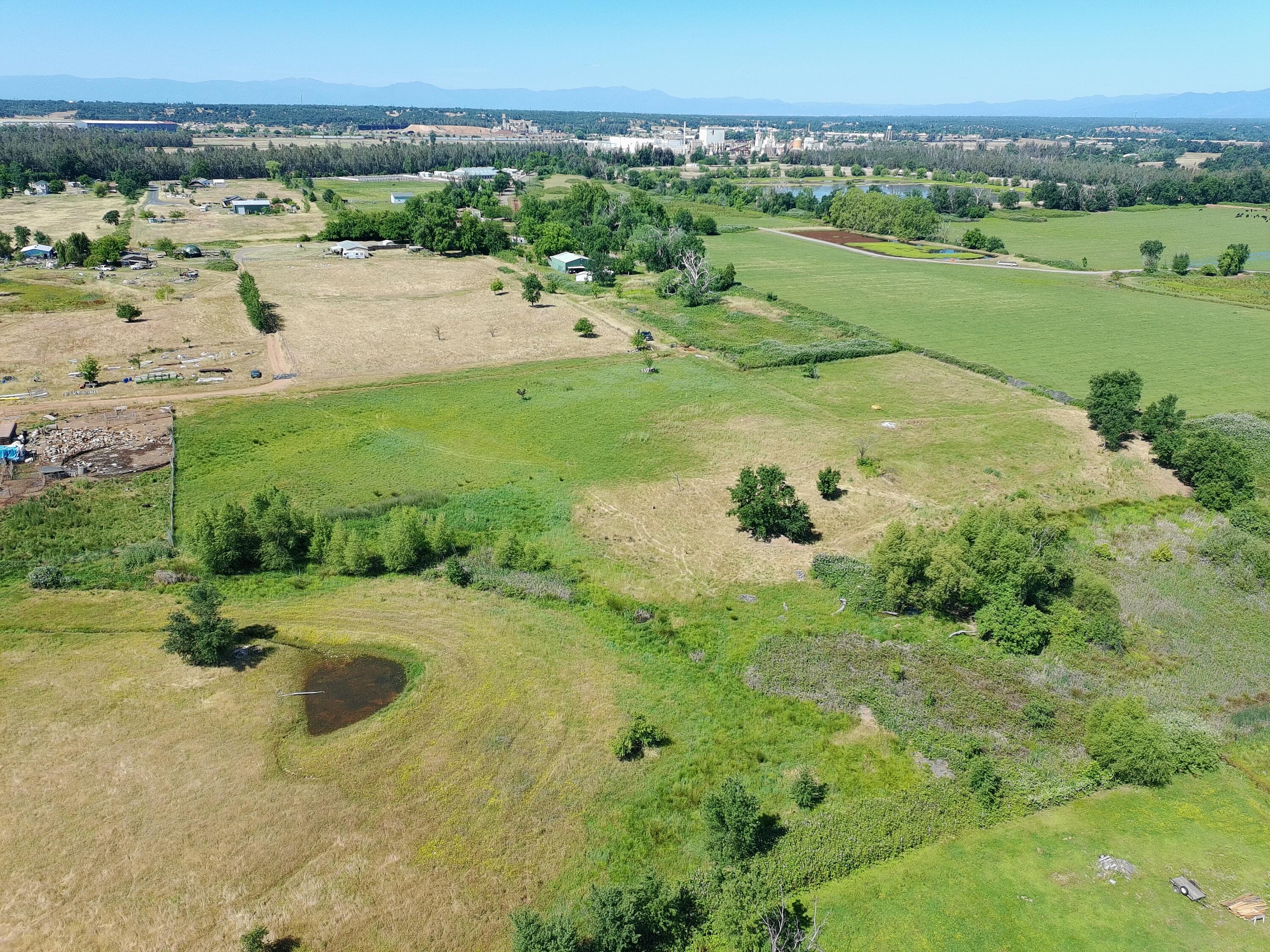 5227 Hopson Road Anderson, CA 96007 - Photo 2 of 19 a view of a lake with a big yard