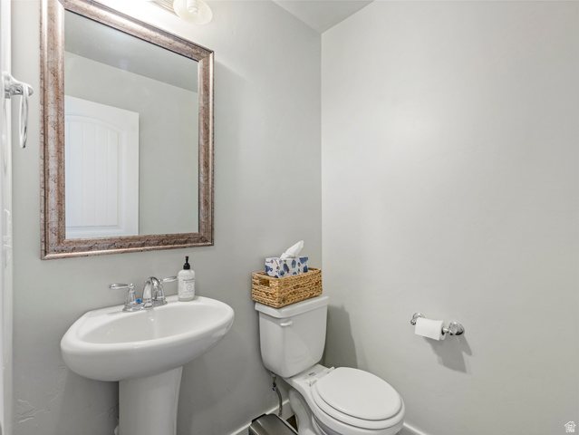 12214 Sunpark Lane Draper, UT 84020 - Photo 10 of 24 Bathroom with toilet and a sink