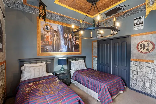 a bedroom with a bed and a table