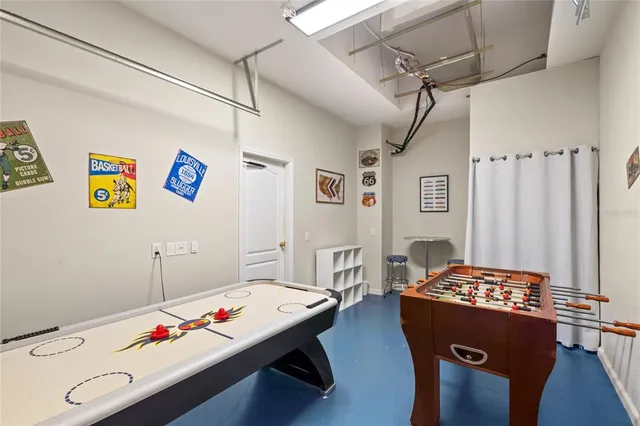 a bedroom with a bed and a table