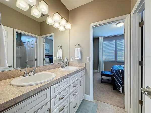 a bedroom with a bed and a cabinets