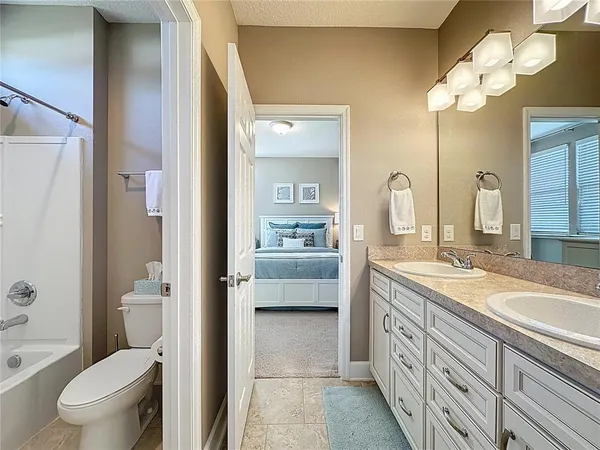 a utility room with closet dryer and washer
