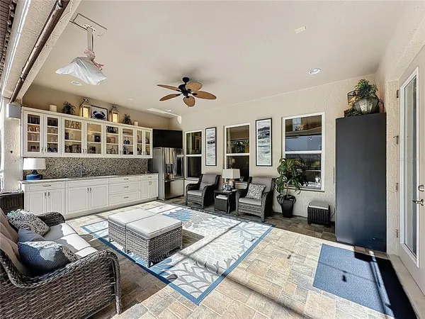 a kitchen with stainless steel appliances granite countertop a stove a sink and cabinets