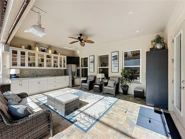 a kitchen with stainless steel appliances granite countertop a stove a sink and cabinets