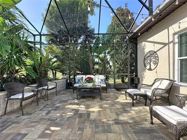 a view of a swimming pool with a yard