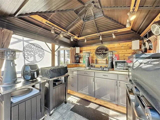 a view of a street with a cars on the road