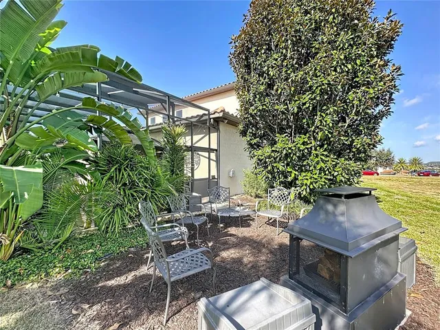 an aerial view of a house with a garden