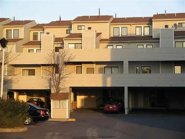 a car parked in front of a building