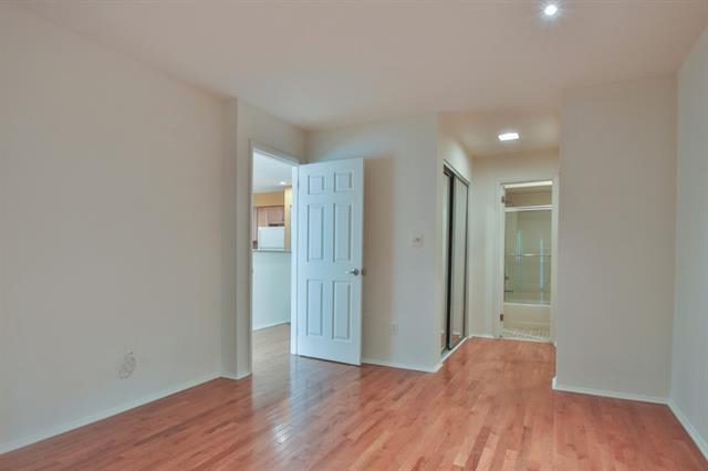700 Mainsail Lane, Unit 700 Secaucus, NJ 07094 - Photo 10 of 28 a view of a hallway with wooden floor