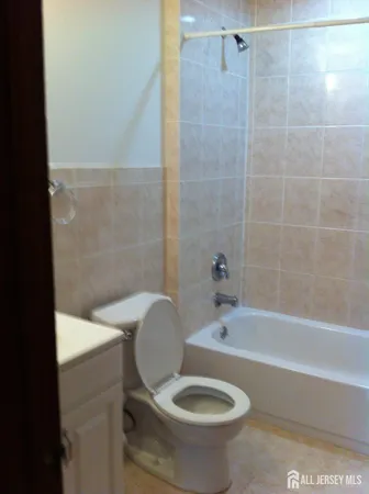 a bathroom with a sink and bathtub