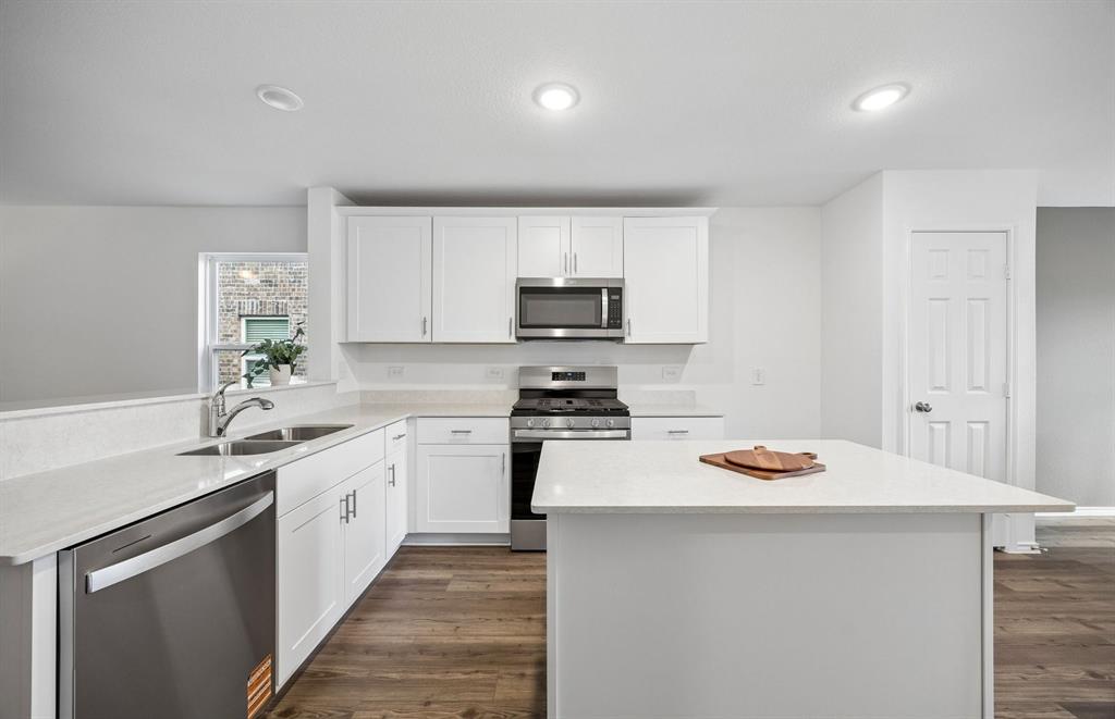 14123 Nullah Street Pilot Point, TX 76258 - Photo 6 of 21 *Model representation Large center island in kitchen