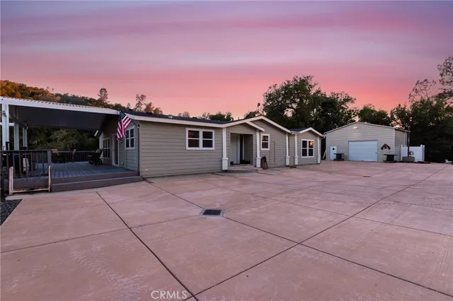 an aerial view of house with an outdoor space