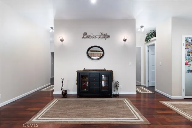 a bathroom with double sink and a mirror