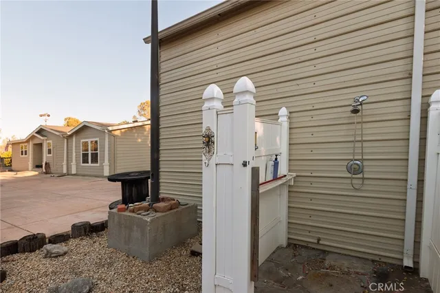 a view of a backyard of the house