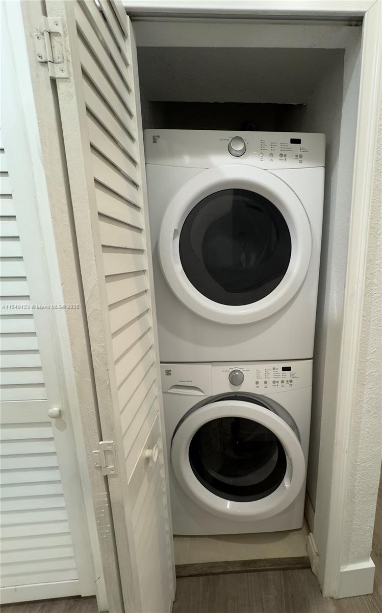 560 Northeast 69th Street, Unit 1 Miami, FL 33138 - Photo 14 of 23 a utility room with dryer and washer