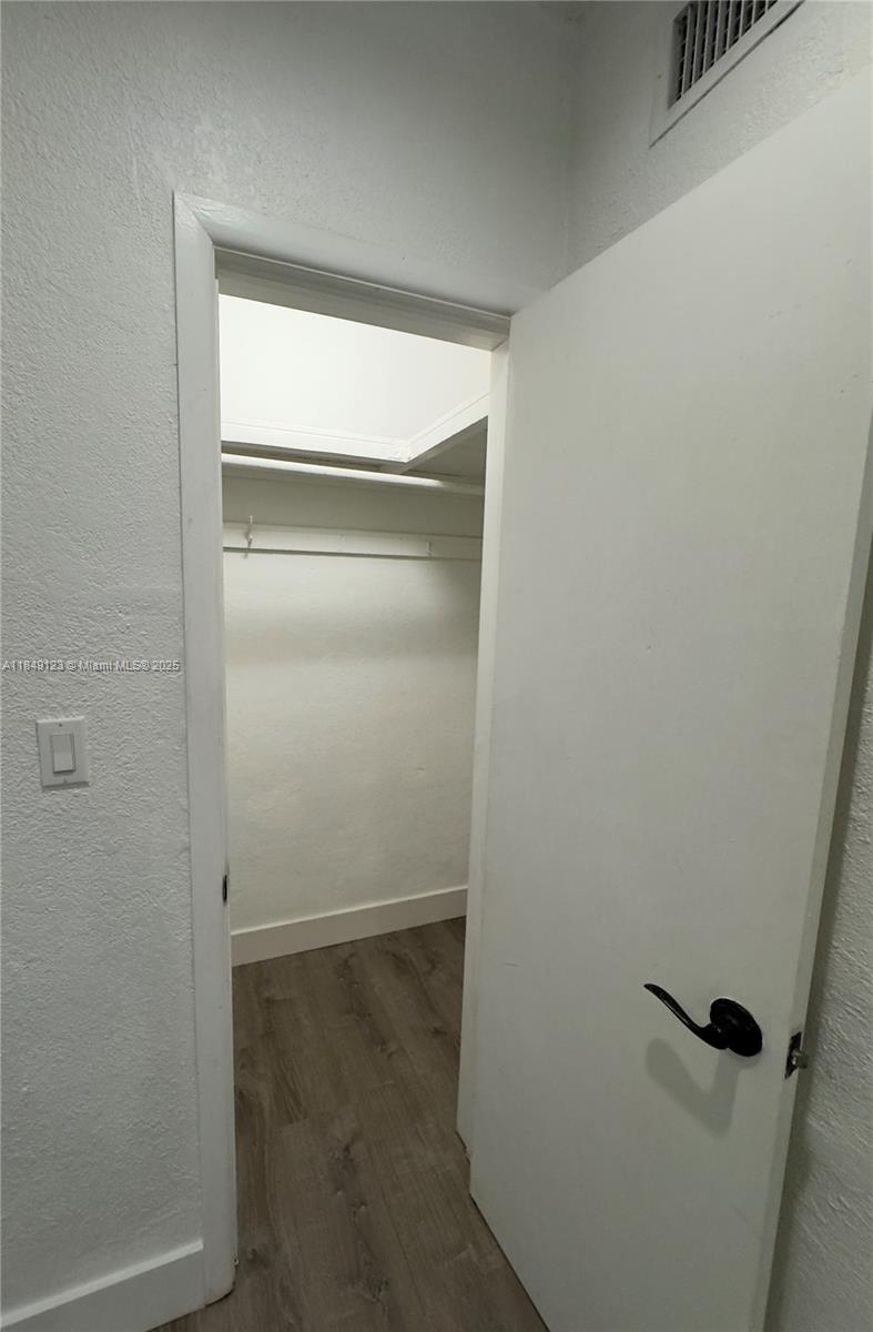 560 Northeast 69th Street, Unit 1 Miami, FL 33138 - Photo 20 of 23 a view of closet