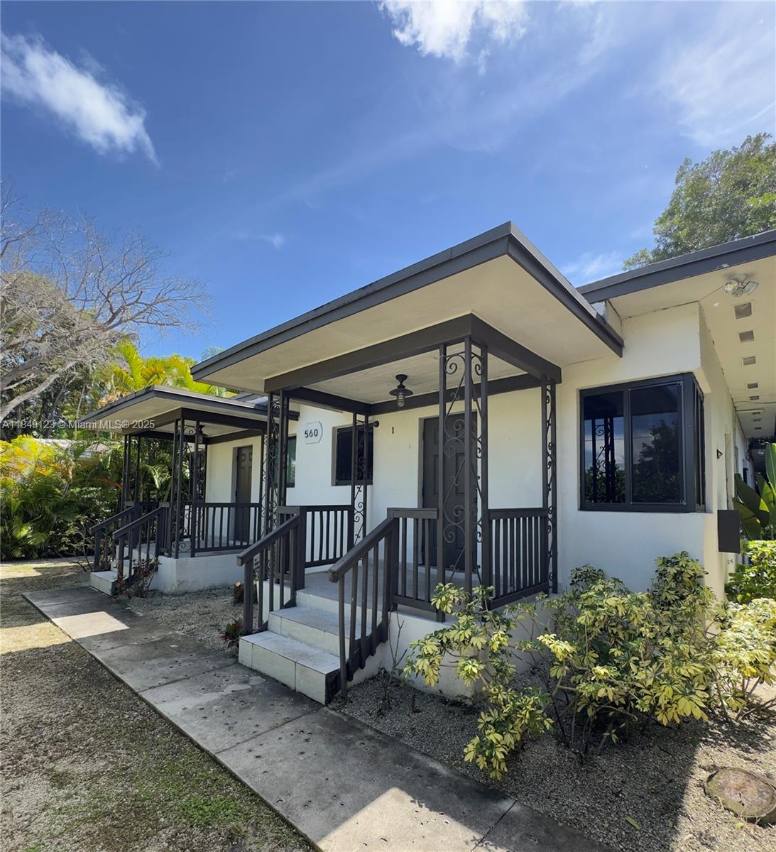 560 Northeast 69th Street, Unit 1 Miami, FL 33138 - Photo 2 of 23 a front view of a house