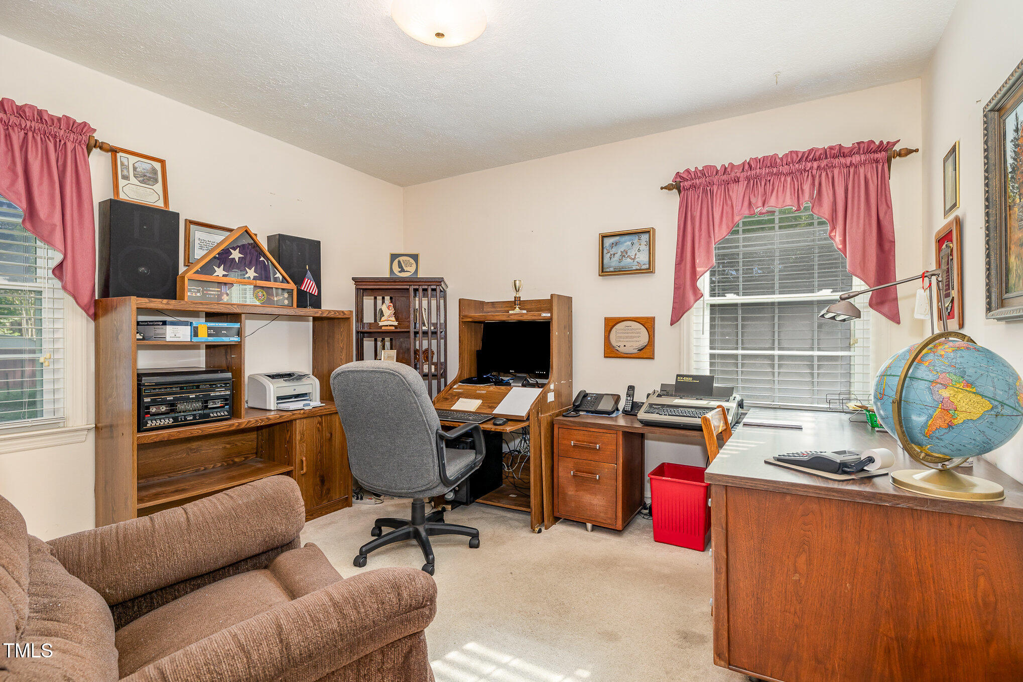 1108 Friendly Road Dunn, NC 28334 - Photo 12 of 17 a view of a workspace with furniture and a window