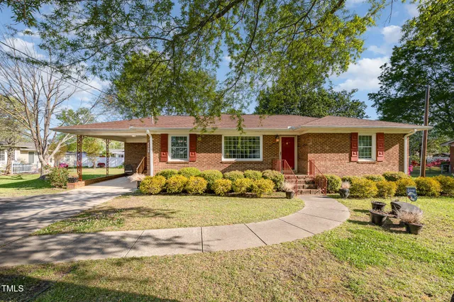 a front view of a house with a patio
