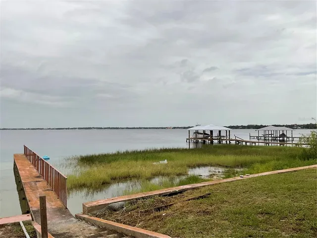 a view of a swimming pool and an ocean
