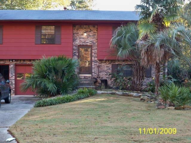 6570 Cameron Road Morrow, GA 30260 - Photo 1 of 1 a front view of a house with garden