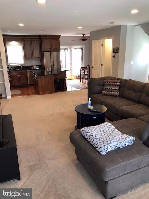 31 Victoria Square Frederick, MD 21702 - Photo 15 of 28 Familyroom, 1/2 Bath and Kitchen