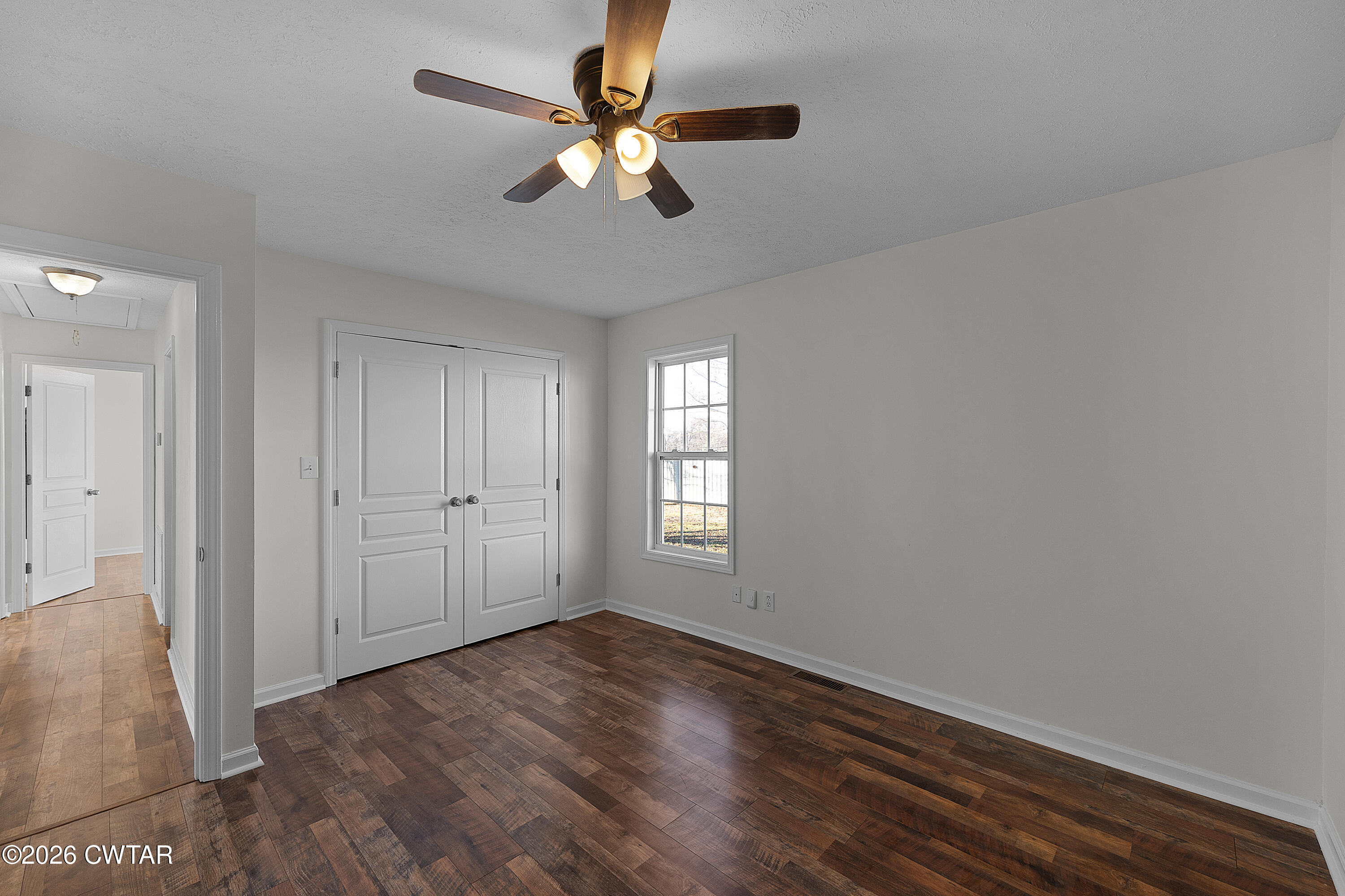 244 Loop Road Trenton, TN 38382 - Photo 20 of 25 wooden floor in an empty room with a window