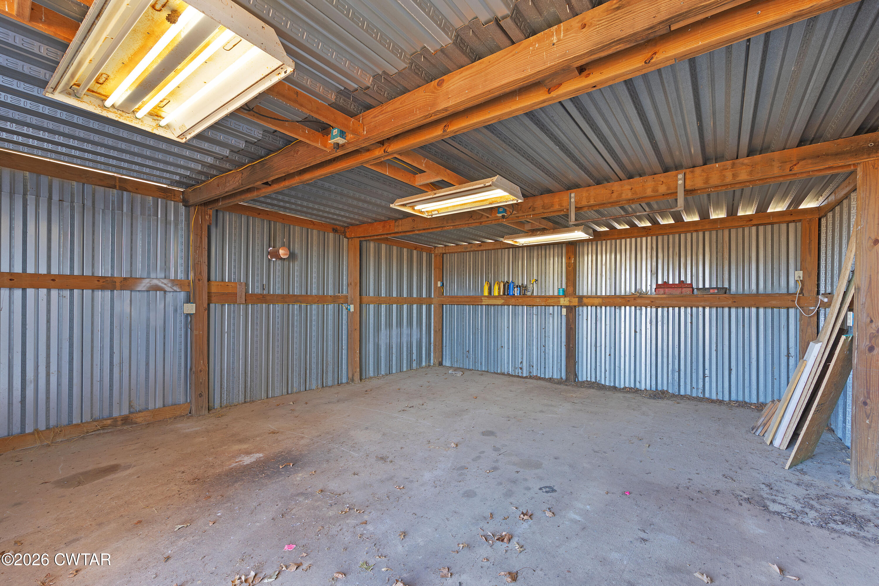 244 Loop Road Trenton, TN 38382 - Photo 8 of 25 a view of a backyard of a house