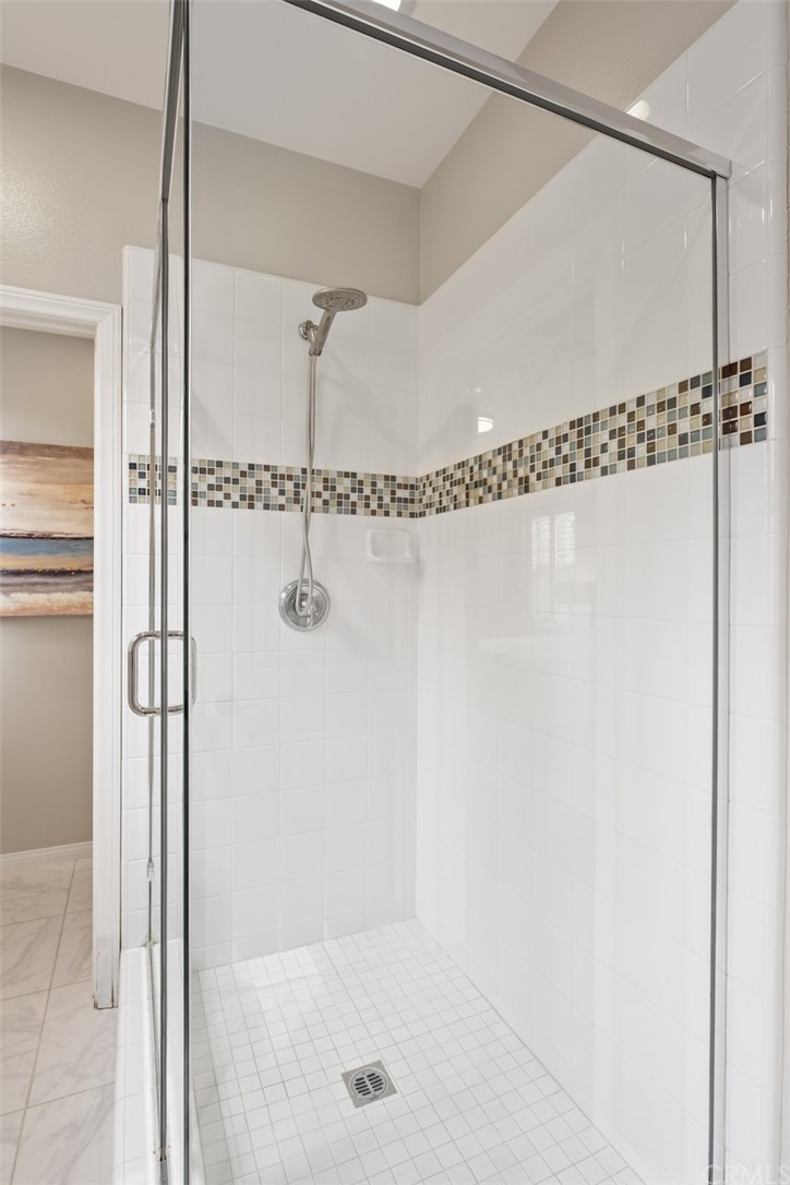 128 Long Grass Irvine, CA 92618 - Photo 26 of 42 a bathroom with a shower