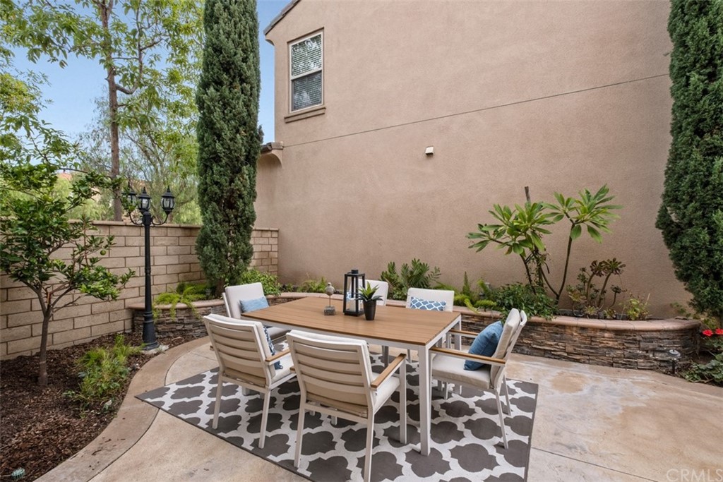 128 Long Grass Irvine, CA 92618 - Photo 35 of 42 a view of an outdoor space with dining area