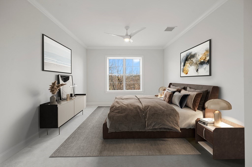60 Coppersmith Way, Unit 404 Canton, MA 02021 - Photo 23 of 42 a bedroom with bed and window