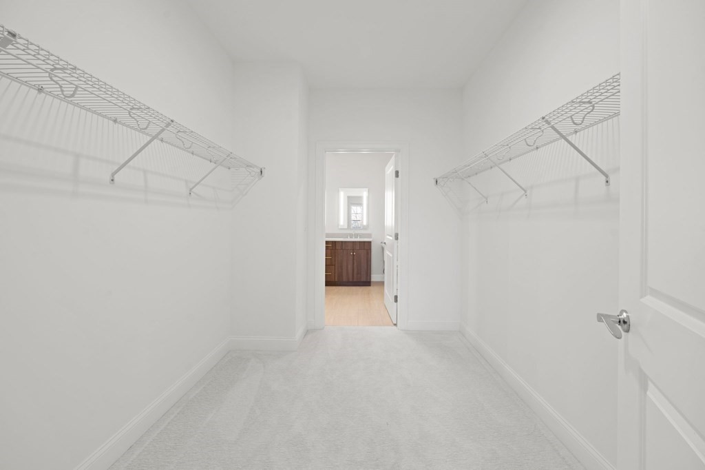 60 Coppersmith Way, Unit 404 Canton, MA 02021 - Photo 33 of 42 a view of an empty room with a window