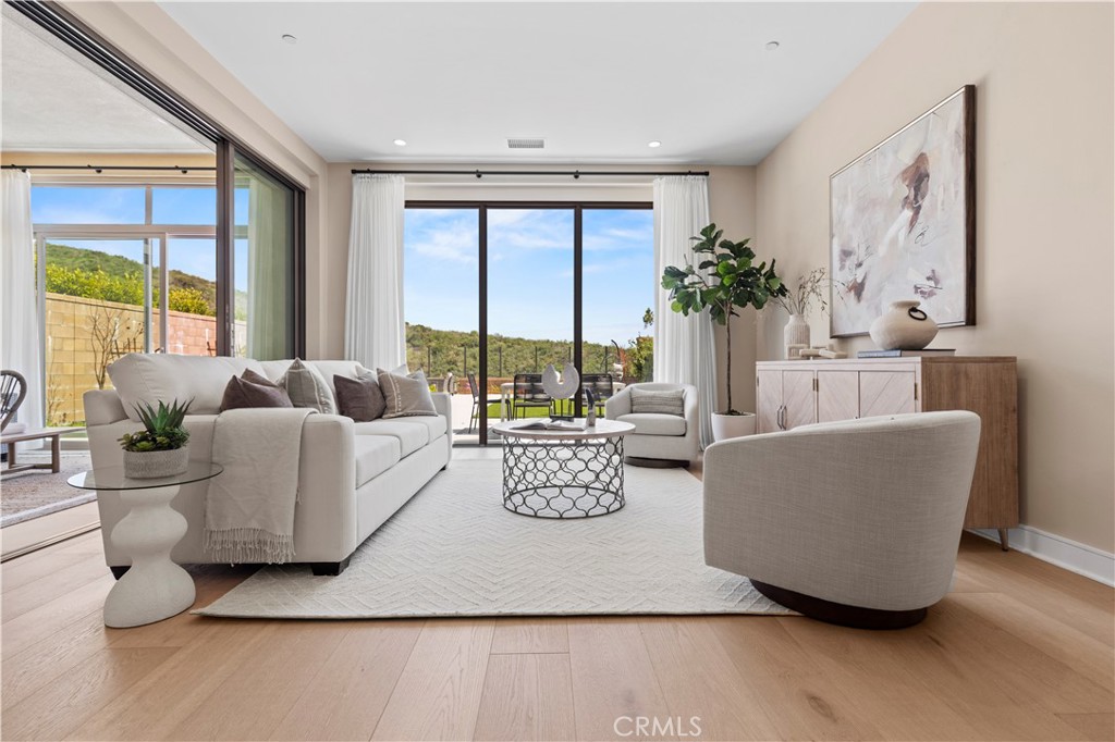 128 Tomahawk Irvine, CA 92618 - Photo 13 of 62 a living room with furniture and a large window