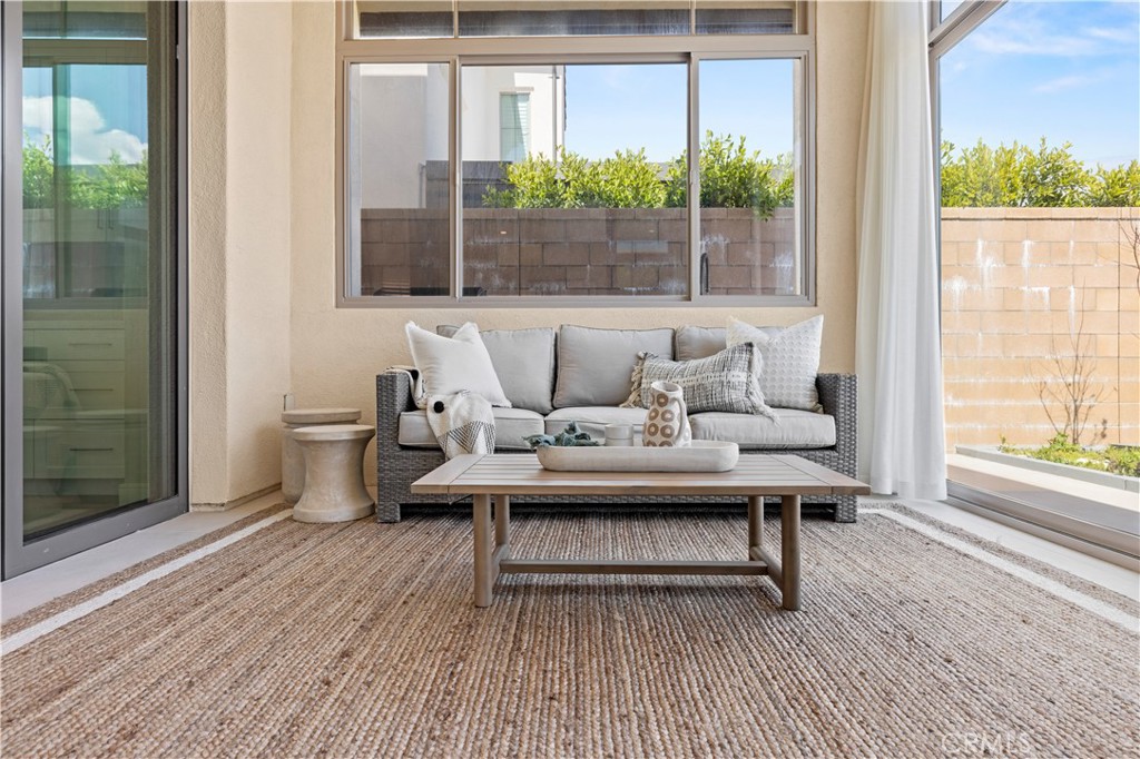 128 Tomahawk Irvine, CA 92618 - Photo 18 of 62 a living room with couch and a table