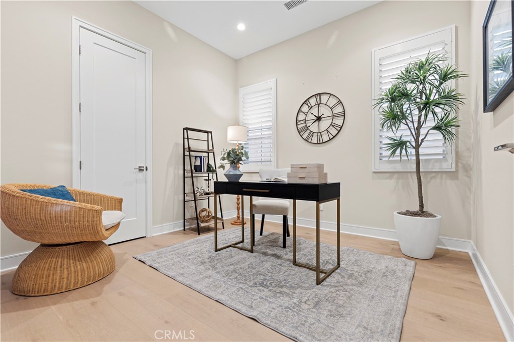 128 Tomahawk Irvine, CA 92618 - Photo 20 of 62 a view of living room filled with furniture and wooden floor