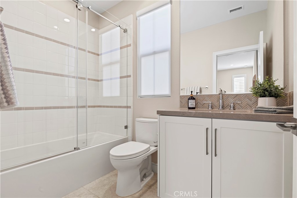 128 Tomahawk Irvine, CA 92618 - Photo 28 of 62 a bathroom with a sink a toilet and shower
