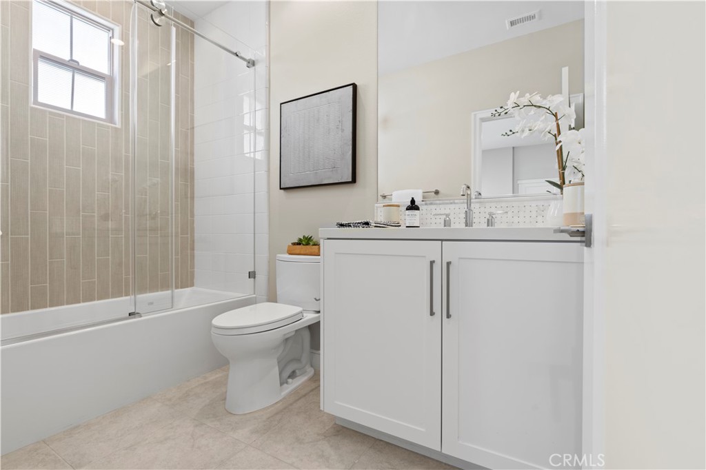 128 Tomahawk Irvine, CA 92618 - Photo 30 of 62 a bathroom with a sink toilet and shower