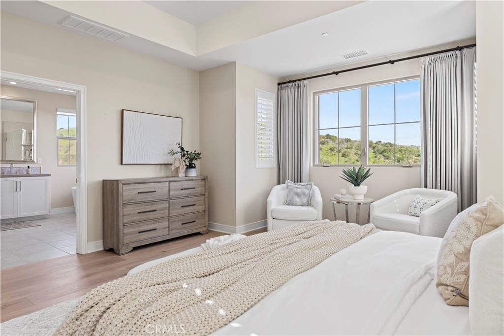 128 Tomahawk Irvine, CA 92618 - Photo 34 of 62 a bedroom with a bed and a dresser